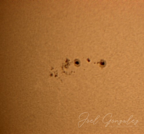 Sunspot 960 taken on 06/04/2007. Very active sunspot which produced a number of M-Class flares. Registax4 was used to align, stack, adjust wavelets, and do histogram stretching. Telescope: - Meade DS-2114ATS-TC on Orion EQ1 motorized mount. Camera: Logitech QC Pro 3000 at prime focus. Filtration used: Baader UV/IR Cut filter, and AstroZap Solar filter (Baader AstroSolar Material). Sun_63-images_Prime01_060407.jpg
